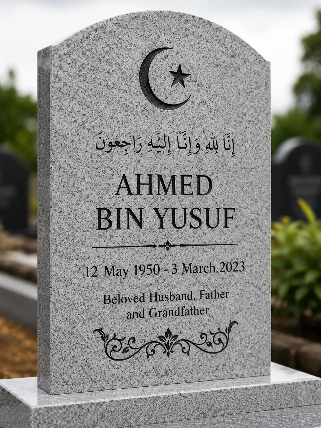 Grey granite headstone with crescent and star and Arabic inscription